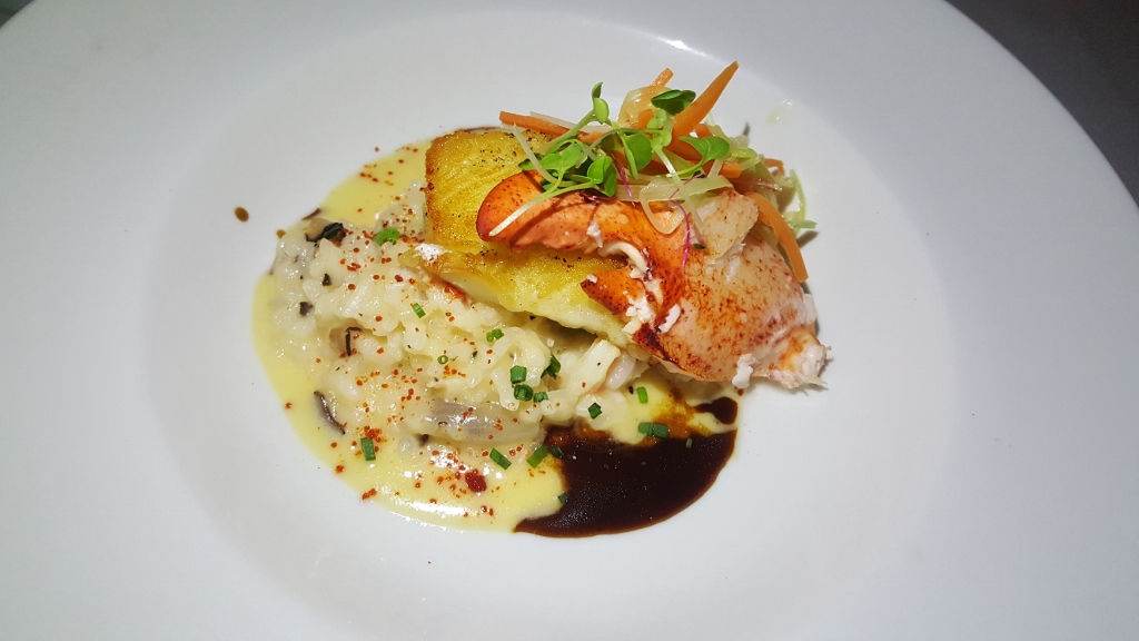 Pan Roasted Sea Bass with Maine Lobster and Truffle Risotto at perla puerto rico
